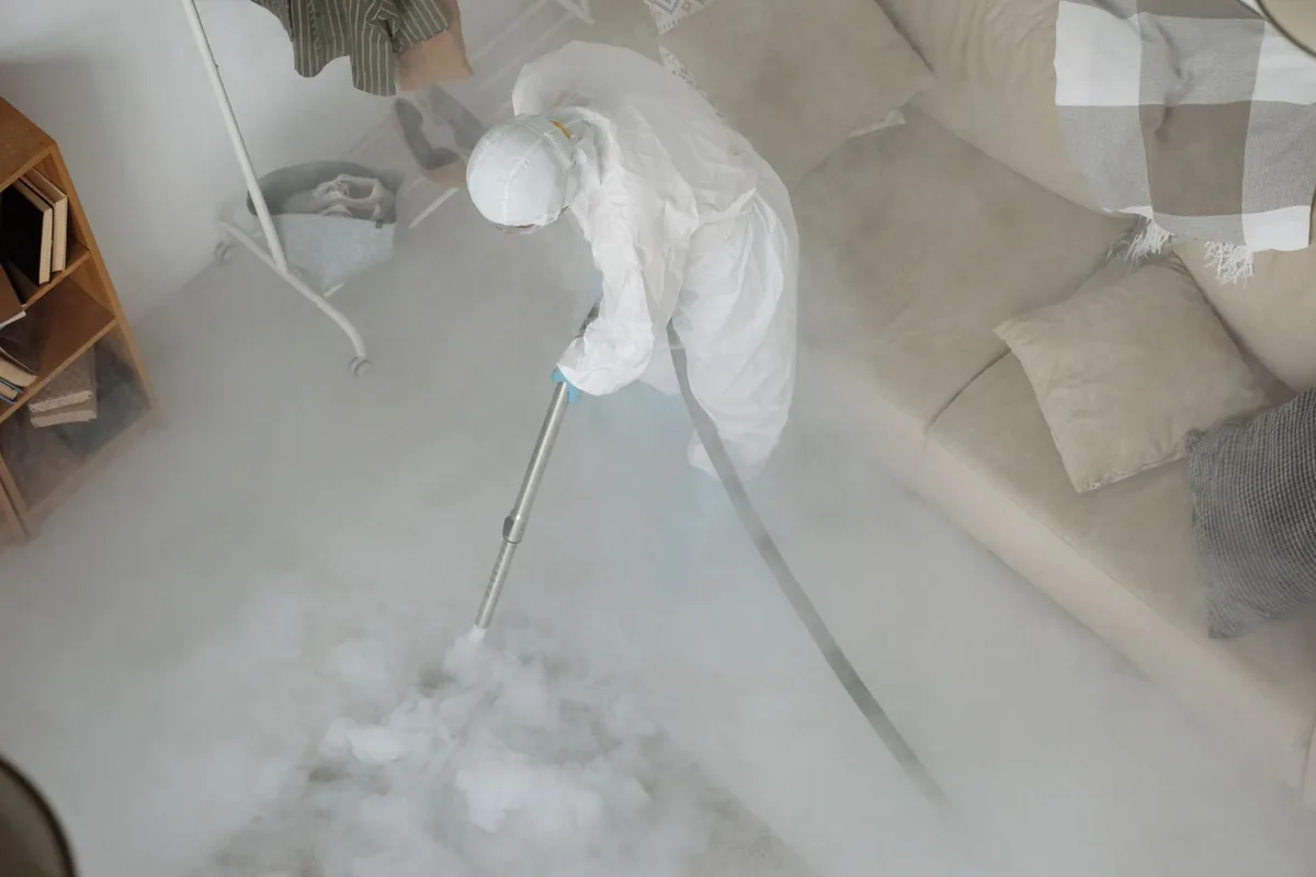 Biohazard cleanup technician in protective equipment, Westfield, MA